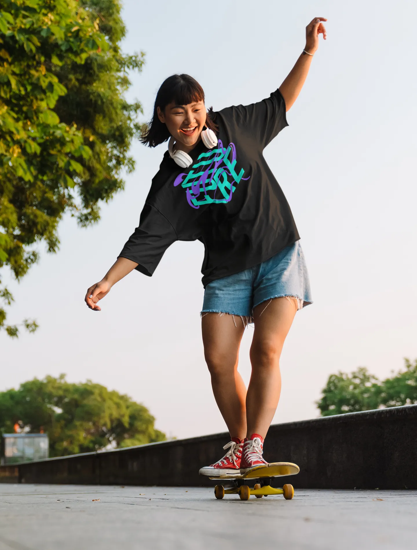Future is Fluid Graphic Tee Teal and Purple Surreal Graphic Tee on front of Black Oversize Deep Drop Shoulder Tee - 190 GSM