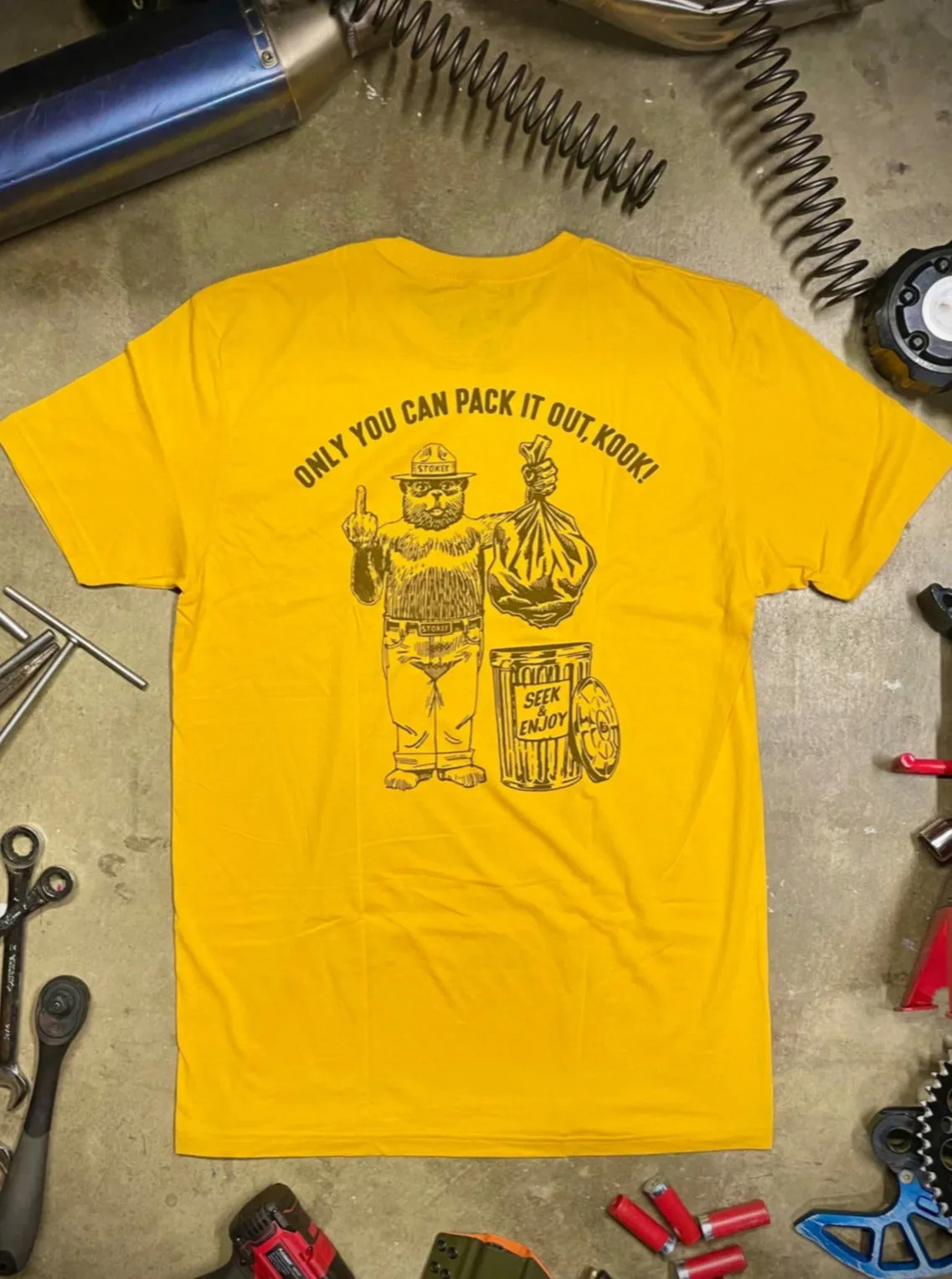 PACK IT OUT TEE | GOLD