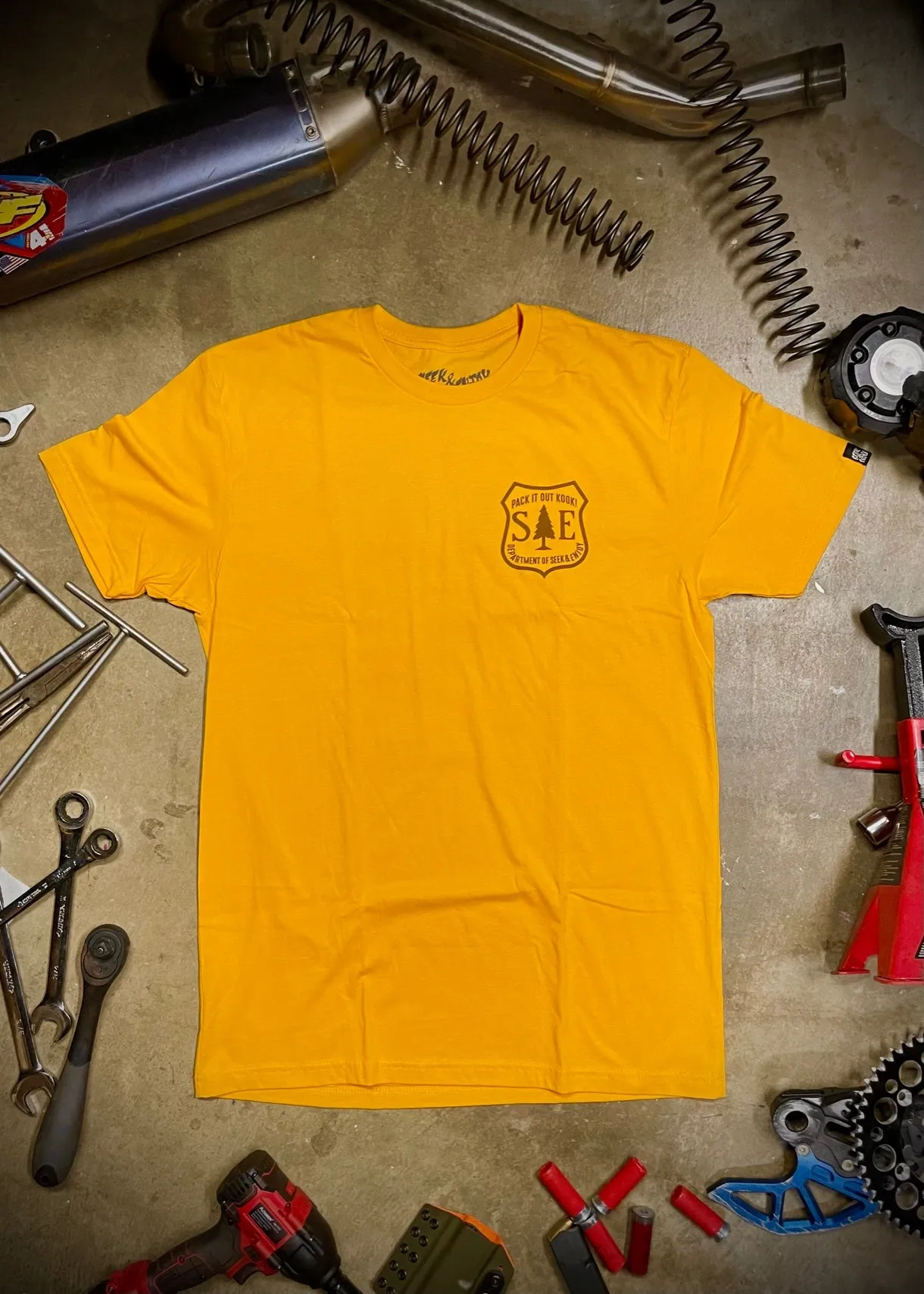 PACK IT OUT TEE | GOLD